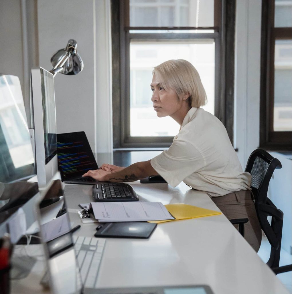 woman at a desk working as a cargo sales agent