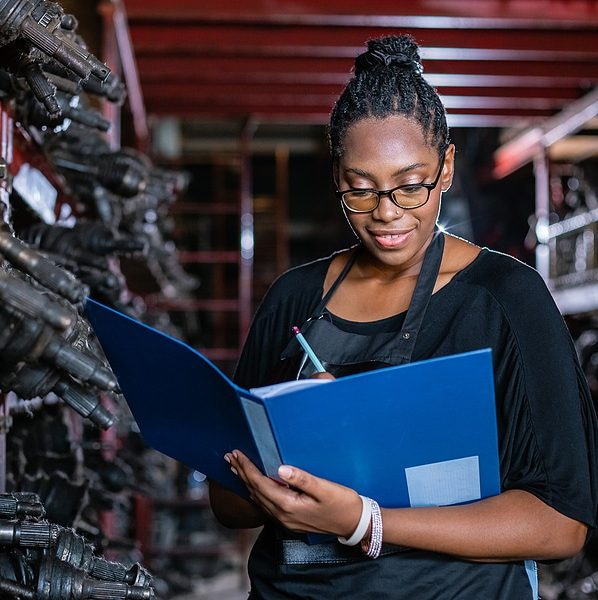 woman doing inventory checking at airport